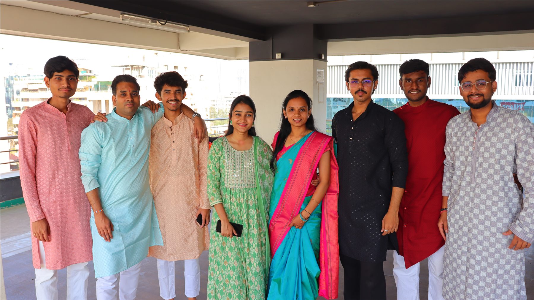 The TechnoEdge team posing together during a festive celebration