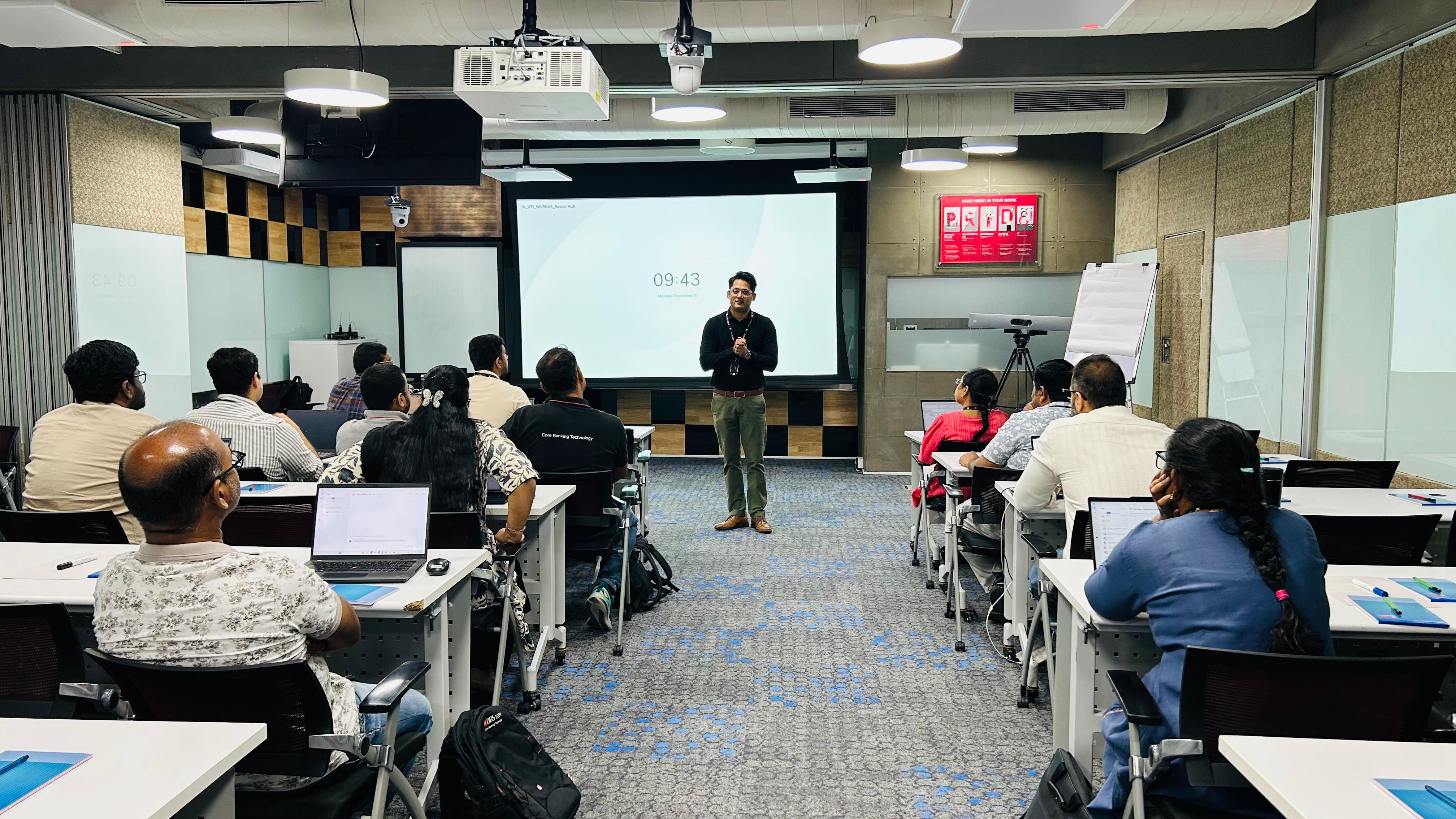 Instructor addressing learners in a corporate classroom